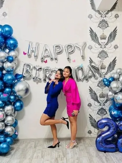 A simple yet chic wall decoration for a 22nd birthday. I used metallic blue and silver balloon garlands with 'Happy Birthday' foil letters to create a perfect photo wall.