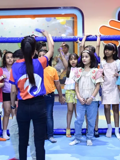 Kids participating in a group game led by one of our trained staff members.
