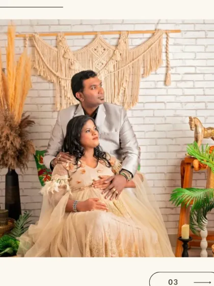 A serene couple's portrait in a bohemian-themed setting, with the mom-to-be wearing our elegant cream-colored gown.