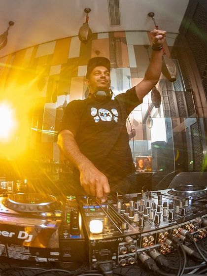 A fisheye lens view from my console at i-Bar, The Park Hotel. The flare of the lights and the energy of the room create an immersive party atmosphere.