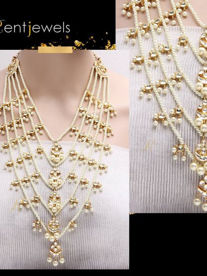 Complete your beautiful look with my layered pearls Kundan rani haar. This long necklace features multiple strands of pearls and Kundan motifs, giving you an overall gorgeous appearance.