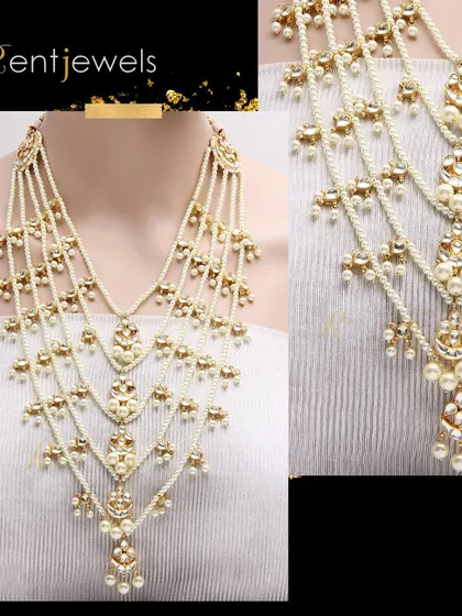 Complete your beautiful look with my layered pearls Kundan rani haar. This long necklace features multiple strands of pearls and Kundan motifs, giving you an overall gorgeous appearance.