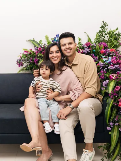 A closer look at this lovely family during their in-home first birthday session. Their relaxed smiles show the comfort and ease of shooting in a familiar environment.