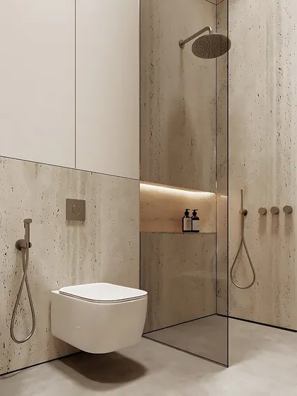 Travertine is one of the trending materials for 2025. Its natural, porous texture adds a raw and earthy elegance to bathrooms and other spaces.