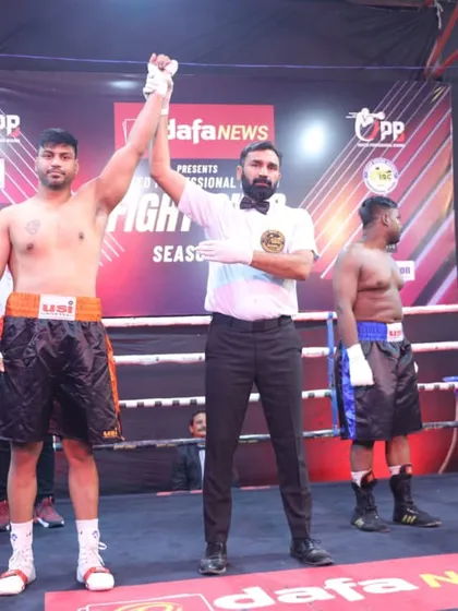 A victorious moment for a fighter at the UPB event. We train our boxers to dominate in the professional ring.
