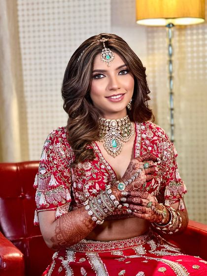 Priyanka's happy smile shows how confident and comfortable she felt. My goal is always to create a look where the bride feels like the best version of herself.