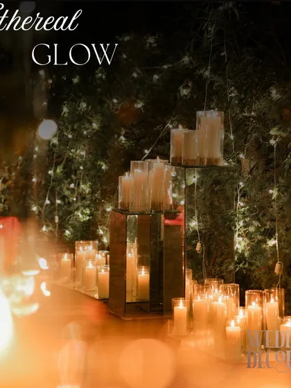 The 'Ethereal Glow' created by clusters of candles on mirrored surfaces. This technique is one of my favorites for creating a powerful sense of magic and romance.