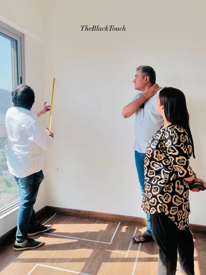 Discussing design details with the client on-site. We believe in a collaborative process, involving our clients in decisions to ensure their vision is realized.