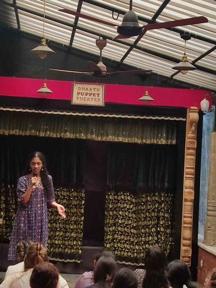One of our young artists addresses the audience, sharing her experiences and insights into the world of puppetry. We are committed to nurturing the next generation of storytellers and cultural custodians.