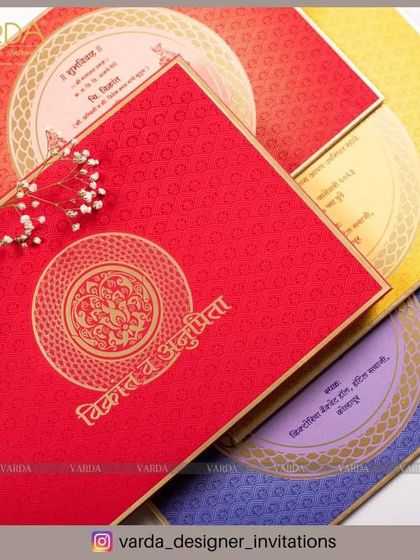 A selection of our vibrant wedding cards designed with beautiful Marathi script and traditional motifs. The use of rich colors like red, yellow, and purple reflects the festive and joyous nature of Maharashtrian wedding celebrations.