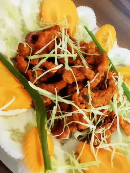 My special Pork Bhujiya. This is a crispy, savoury preparation that is perfect as a side dish or a snack. It’s a simple dish with a lot of texture.