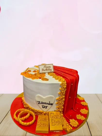 I enjoy blending tradition with creativity, like in this unique saree-themed cake. The design features an elegant red fondant saree drape, intricate gold jewelry details, and even edible gold bars, making it perfect for celebrating a special woman in your life.