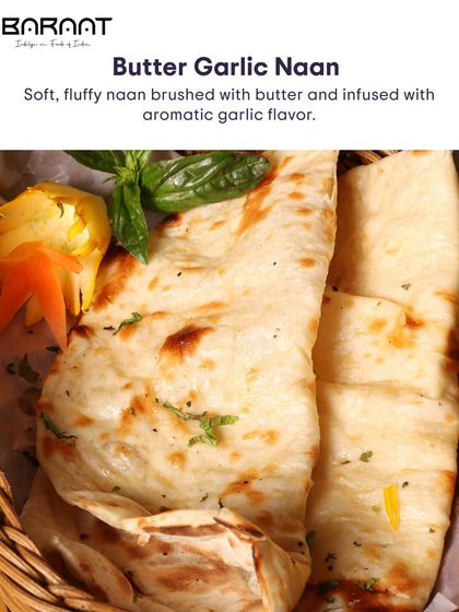 This soft, fluffy Butter Garlic Naan is brushed with butter and infused with aromatic garlic flavour, a perfect companion to any dish.