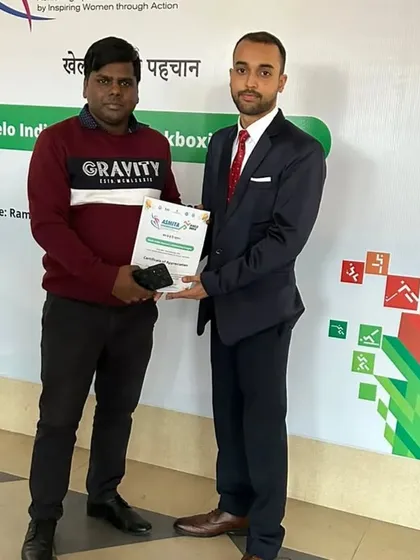Presenting a certificate to another official, recognizing our collective effort.