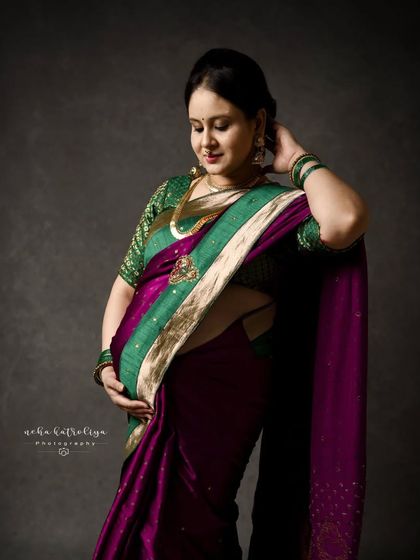 A gentle, downward glance, showcasing the beautiful details of the saree and traditional jewelry. These are portraits rich in culture and emotion.