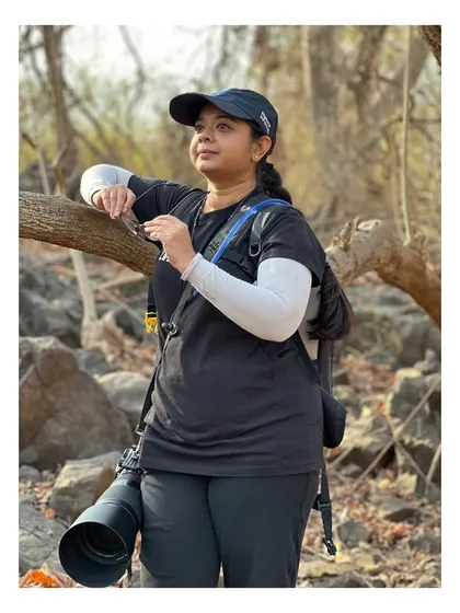 Taking a break during a birding trip. My friend captured this moment of me just enjoying the peace of the forest.