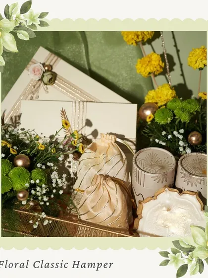 Our Floral Classic Hamper, another beautiful option that integrates fresh flowers with our gourmet gift boxes and pouches, creating a stunning presentation.