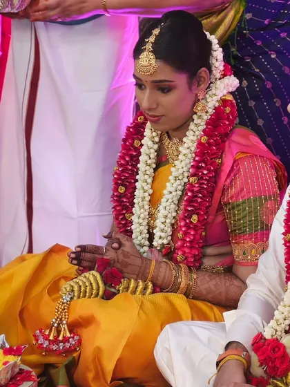 A candid shot of Subasini during her muhurtham ceremony, looking serene and beautiful.