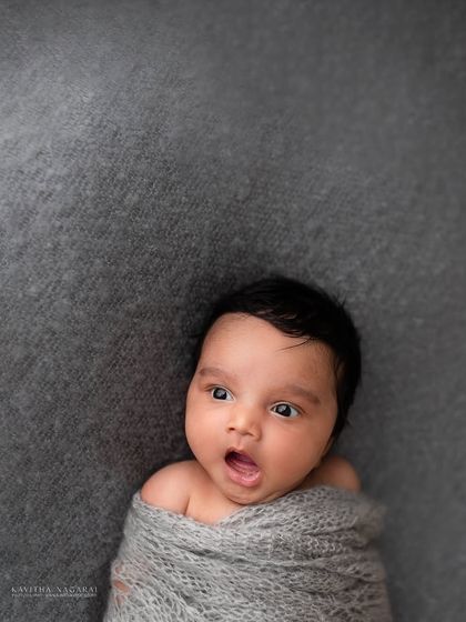 Five-week-old Agastya with a surprised and curious expression. His personality shines in this awake shot, proving that every stage has its own magic.