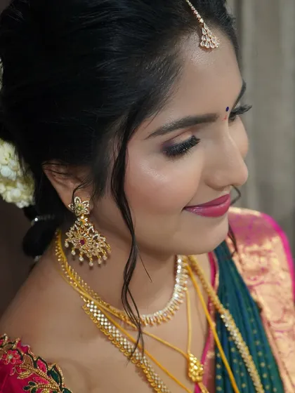 This profile view shows the precision of the eye makeup and how the skin still looks like skin. My goal with HD makeup is to ensure you look flawless from every angle, with a soft glam that highlights your best features.