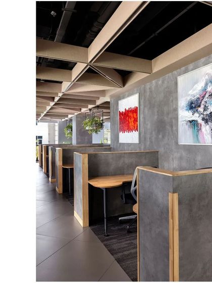 We designed semi-private pods for focused work within the open-plan Paras Healthcare office. These spaces offer a degree of acoustic and visual privacy while still feeling connected to the larger environment.