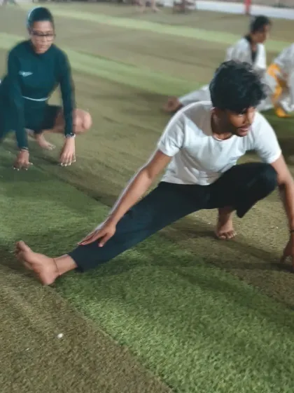 An advanced student demonstrates a deep side lunge stretch. We cater our flexibility training to all levels, from beginners to our most experienced martial artists.
