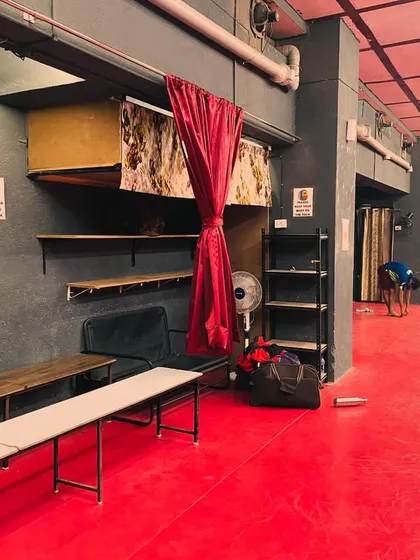 The side view of our academy, showing the seating area for players and the ample space designed for effective coaching and movement.