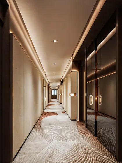 Another view of the hotel passage, showing the elegant glass doors of a suite entrance.