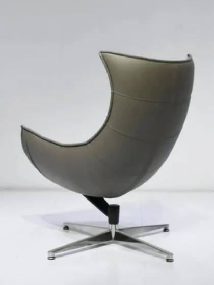 The back view of our curved lounge chair, showing how the single-form design envelops the user.