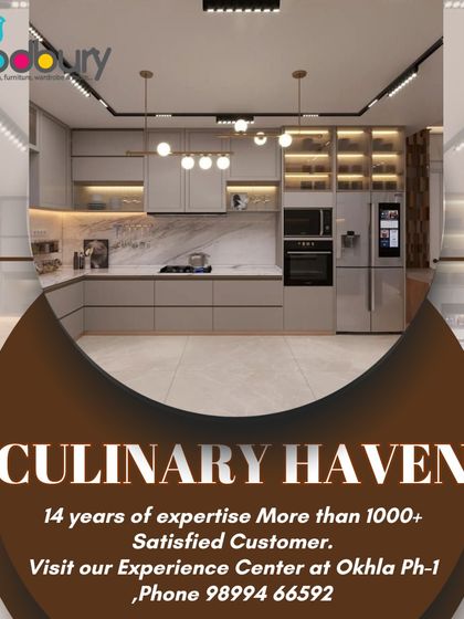 This concept for a culinary haven features light grey cabinets, a marble backsplash, and integrated appliances. The track lighting and pendant lights ensure the space is well-lit.