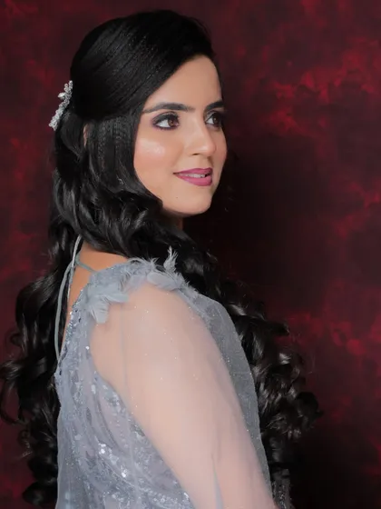 A beautiful party look with soft curls and a smokey eye. Perfect for any evening event.
