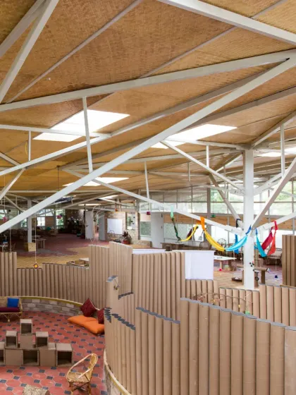 The interior of the Atelier school in Bangalore showcases our belief in designing for the future. The open, light-filled space is defined by partitions made from paper tubes and a bolted steel frame, all chosen so the building can be easily disassembled and its components reused, eliminating waste from the very start.