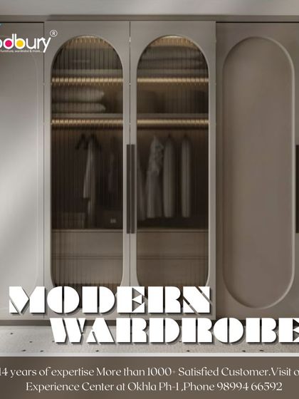 Arched, fluted glass doors can add a touch of softness and elegance to a modern wardrobe, as shown in this design concept.