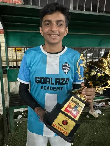 All smiles from our Under-15 winner, proudly displaying the trophy after a hard fought tournament at the Winter Cup.