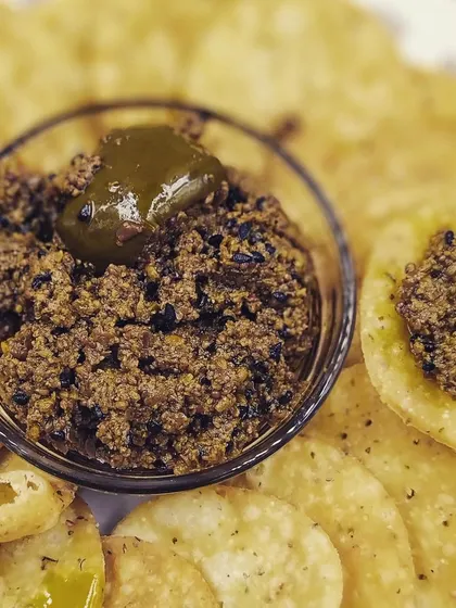 This is the Aam ka Achaar that started it all, the first recipe my mother taught me. Served here with some crispy mathri, it is a classic Banarasi style pickle that is a staple in my home and I hope it becomes one in yours too.