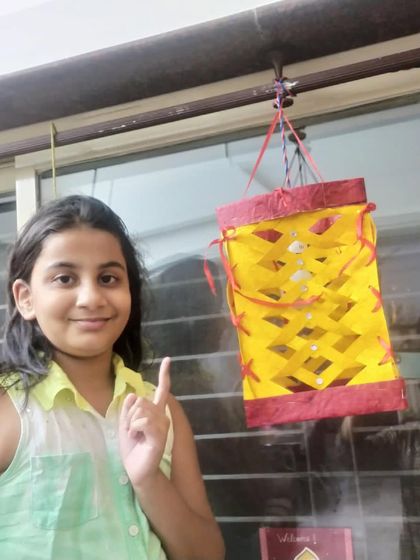 Another creative lantern design from our Diwali workshop. Students get to choose their own colors and patterns to make their creations special.