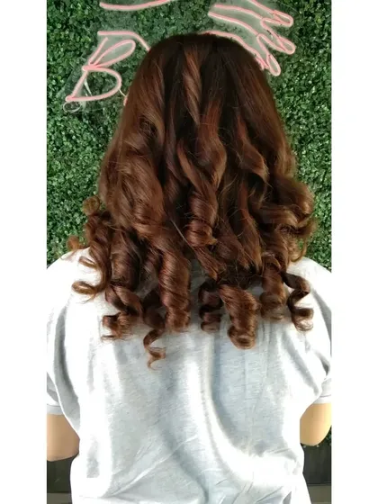 This is a rich, chocolate brown global hair color. It's a fantastic option for anyone wanting a single, uniform shade that is full of depth and incredible shine.