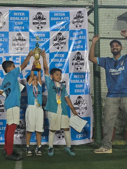 Pure celebration from our Under-8 winners at the Inter Goalazo Cup, lifting their trophy high with their coach.