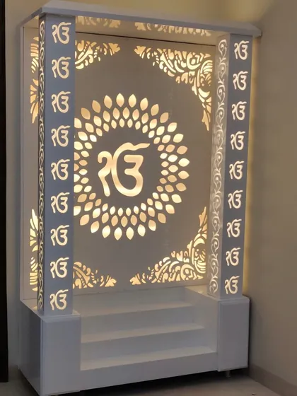 The warm glow from the backlight makes this mandir a peaceful focal point in the evening.