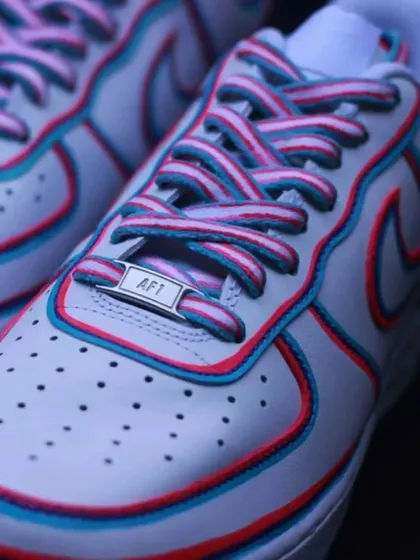 A macro shot of the front of the "Wired" custom, showing the painted laces and AF1 deubré.
