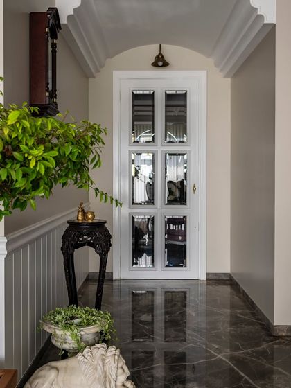 This entrance foyer marked the beginning of my love affair with classical design. The intricate details, rich textures, and grand proportions of this Mumbai home's entryway have captured my heart.