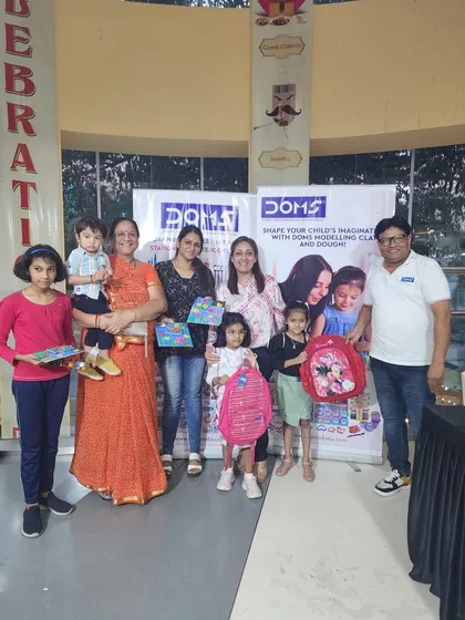 The smiles on the faces of these families say it all. Our workshops are about creating joy and spreading a love for art.