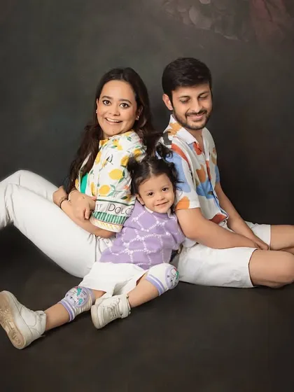 A relaxed and happy family portrait celebrating their little girl's second birthday. I love capturing these casual, connected moments that show your family's unique bond.