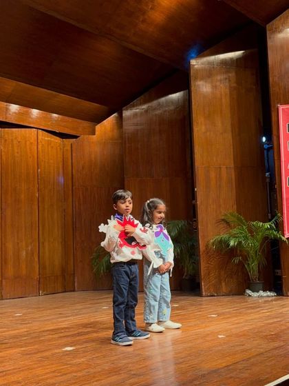 This pair showcases their creative costumes and props, designed to tell a story about feelings.
