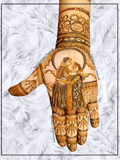 A sweet and romantic couple portrait for a Karwa Chauth celebration. The design is centered on the palm, making it the focal point of the henna.