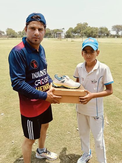 Ayush Chaursia receiving new cricket shoes as his Man of the Match prize. We believe in rewarding top performers to keep them motivated.