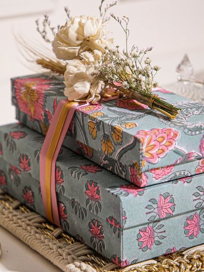 The beauty is in the details. Our gift boxes are wrapped in stunning floral prints and tied with delicate ribbons and a sprig of dried flowers, making the gift special before it's even opened.