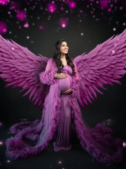 This is our signature shot, with a new creative twist. The grand wings and flowing gown make this moment feel nothing less than heavenly.