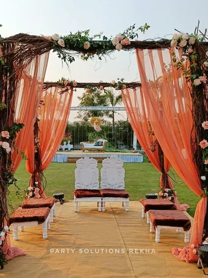 For couples who dream of a natural, romantic setting, I design rustic mandaps like this one. The structure of intertwined branches, soft peach draping, and delicate floral accents creates an earthy yet elegant space for the sacred wedding ceremony.