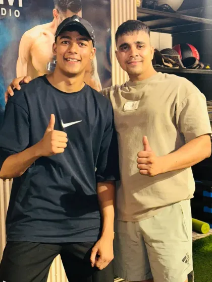 With a young client at the gym. It's great to see the next generation embrace fitness.